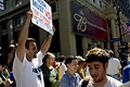 bush supporter, anti-bush marchers, united for peace & justice march, 34th street, nyc, august 2004