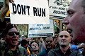 supporters of the iraq war, anti-war protester, united for peace & justice march, herald square, nyc, august 2004