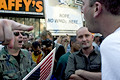 supporters of the iraq war, anti-war protester, united for peace & justice march, herald square, nyc, august 2004