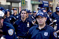 police held in reserve, united for peace & justice march, 5th avenue, nyc, august 2004