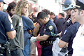 police arresting protesters who gathered near broadways shows republican delegates were attending, 8th avenue, nyc, august 2004