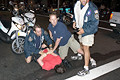 protester tackled and arrested by scooter squad, park avenue, nyc, august 2004