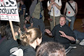 priest, protesters refusing to move, protest during bush's nomination acceptance speech, 8th avenue & 30th street, nyc, september 2004