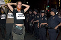 police, protesters, protest during bush's nomination acceptance speech, 8th avenue & 29th street, nyc, september 2004